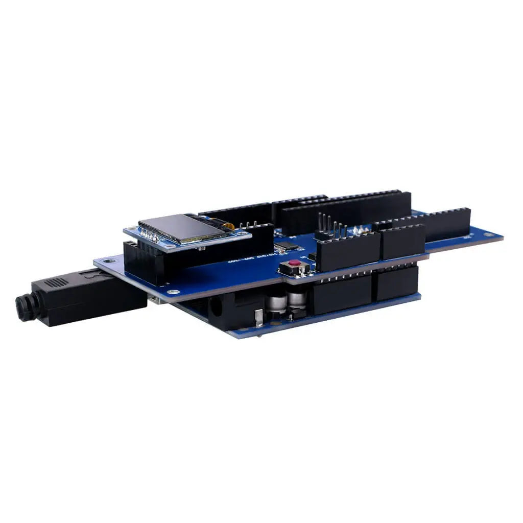 DisplayModule 0.96-inch graphic OLED module installed on a compact adapter board